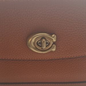 Coach Tan Leather Crossbody Bag with Turnlock Hardware